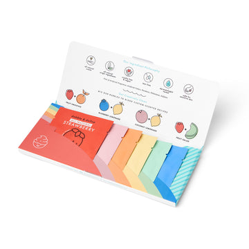 Just a Dabble Minis Set by Dabble & Dollop has an open box with six travel-friendly drink mix packets in fruity flavors like strawberry and citrus. The lid highlights natural ingredients with vibrant fruit graphics, making it perfect for on-the-go refreshment.