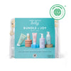 Clear zippered pouch with a label featuring five newborn skin care products from Dabble & Dollop's Bundle of Joy Gift Set, highlighting gentle, natural ingredients and an EWG Verified green seal in the top right corner.