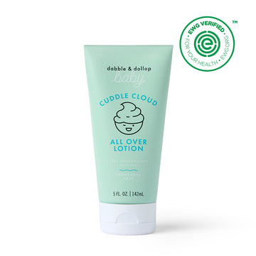 A light green 5 fl oz (142 ml) tube of Dabble & Dollop Cuddle Cloud™ All Over Lotion, featuring a cloud and baby face graphic and an EWG Verified seal, made with natural ingredients—perfect for babies.