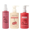 Three bottles of Dabble & Dollop Detangler and Conditioner feature playful cherry and strawberry designs, including a detangling spray, conditioner, and an all-natural strawberry body wash and shampoo.
