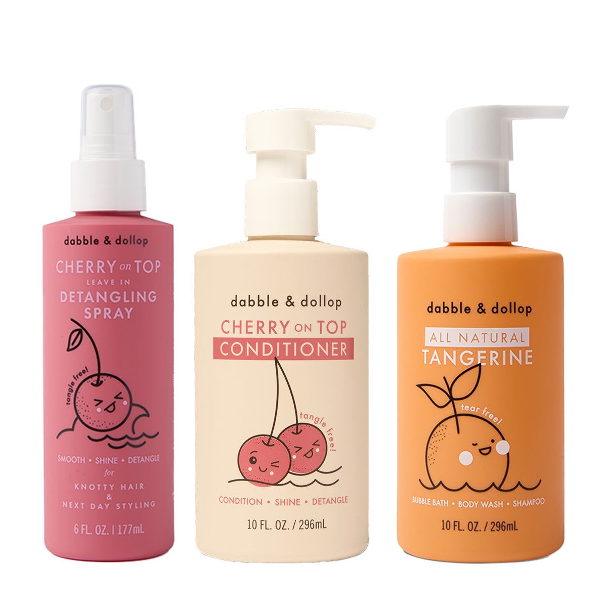 Three colorful bottles of Dabble & Dollop kids’ Detangler and Conditioner with cute fruit illustrations, plus a tangerine bubble bath/body wash/shampoo.