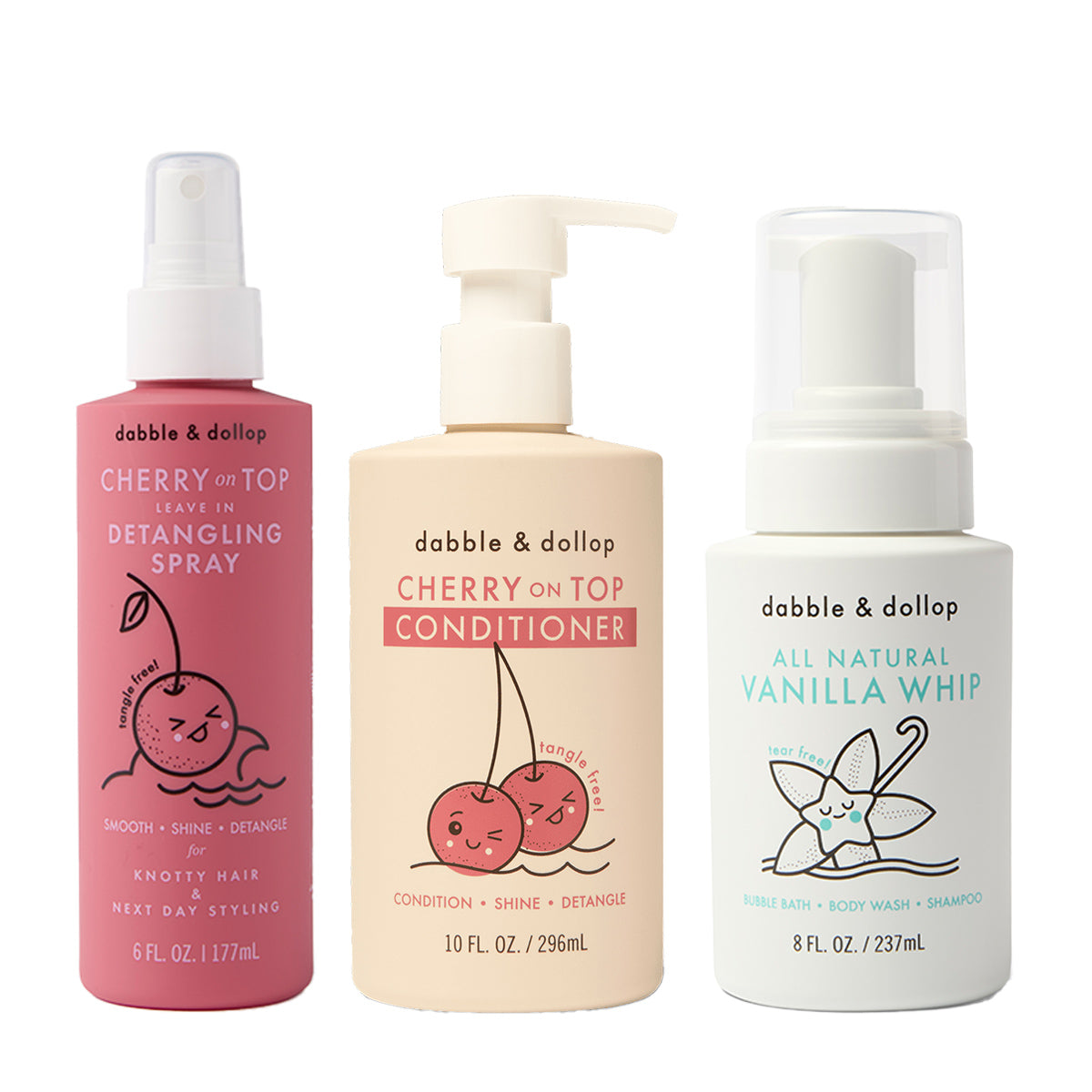 Three bottles of Dabble & Dollop Detangler and Conditioner: pink Cherry on Top Detangling Spray, beige Cherry on Top Conditioner, and white All Natural Vanilla Whip, all featuring playful fruit illustrations.