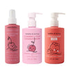 Three pink Dabble & Dollop bottles: Detangler and Conditioner with playful fruit illustrations and pump or spray tops, plus a Strawberry Gel, all featuring bright, fun designs.