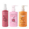 Three Dabble & Dollop bottles—Detangler, Conditioner (both pink), and Tangerine Gel (orange)—stand side by side. Each features cute fruit cartoons and simple labels.