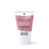 The image displays a pink and white tube of Dabble & Dollops Coconut Body Lotion. The back lists details, ingredients, symbols for vegan and cruelty-free status, and a barcode highlighting its all-natural coconut scent.