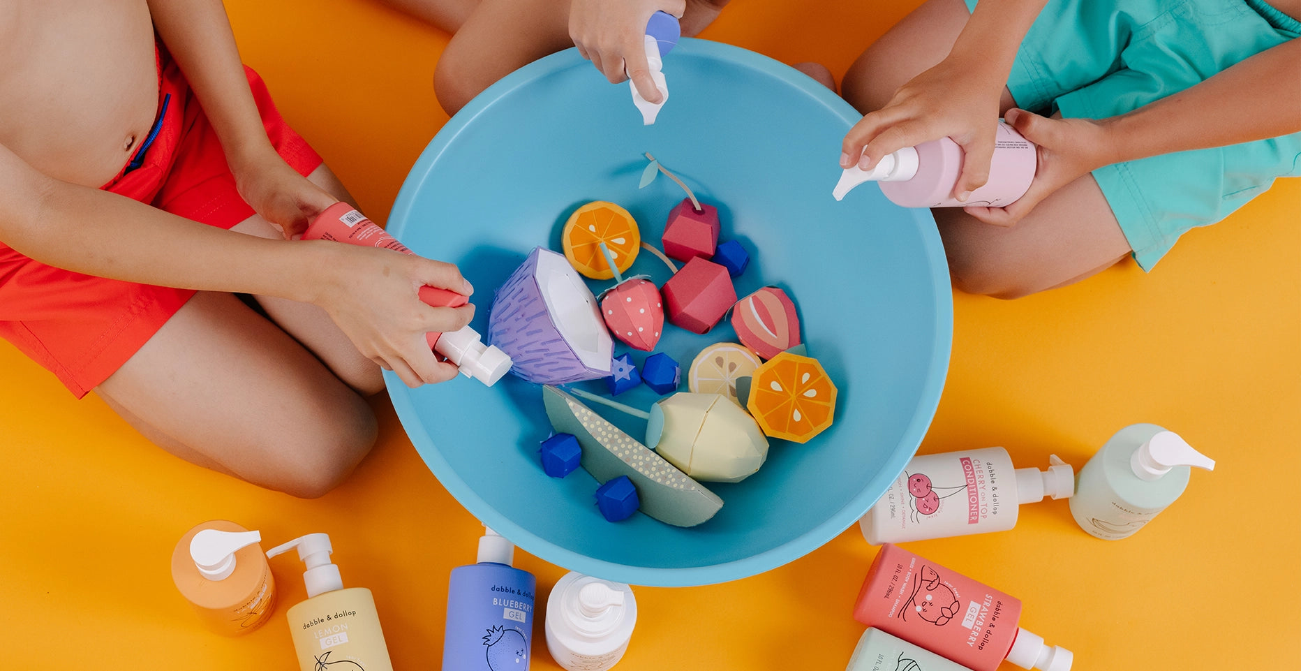 Kids mixing bath products to create their own scents