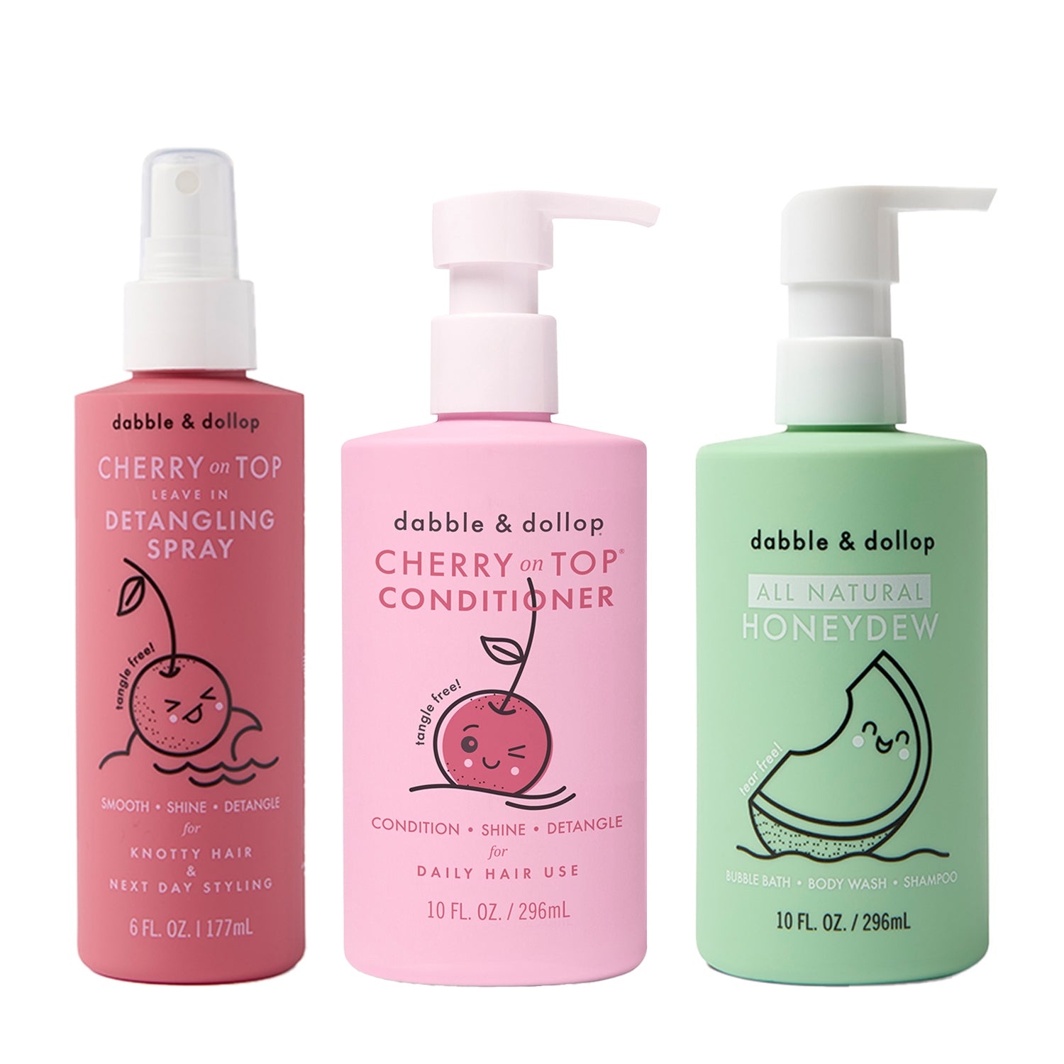 Three Dabble & Dollop products stand side by side: a pink spray Detangler and Conditioner with Cherry on Top, a pink pump bottle Cherry on Top Conditioner, and a green pump bottle All Natural Honeydew.