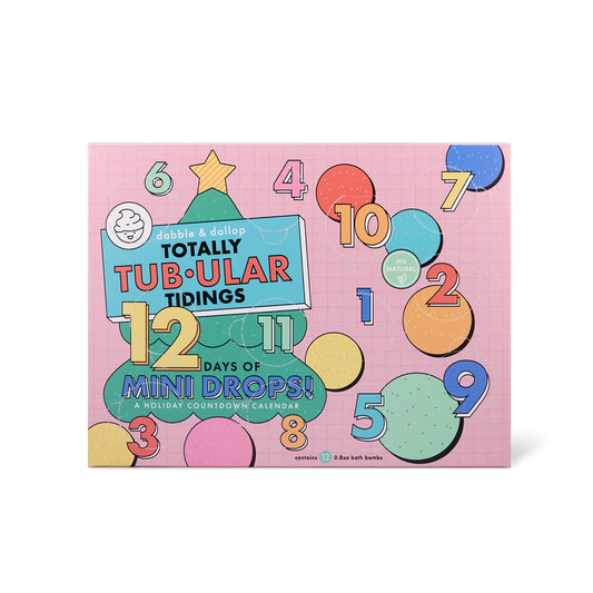 A festive, kid-friendly advent calendar by Dabble & Dollop in a Christmas tree shape. Enjoy 12 days of mini bath bombs with the Totally Tub-ular Tidings Hot Chocolate Soak—your bath time holiday countdown!.