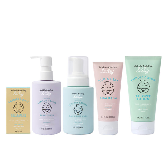 The Dabble & Dollop Bundle of Joy Gift Set features five gentle, pastel-colored baby essentials—skin balm, bubble bath, hair and body wash, bum balm, and all-over lotion—ideal for a fragrance-free baby care gift.