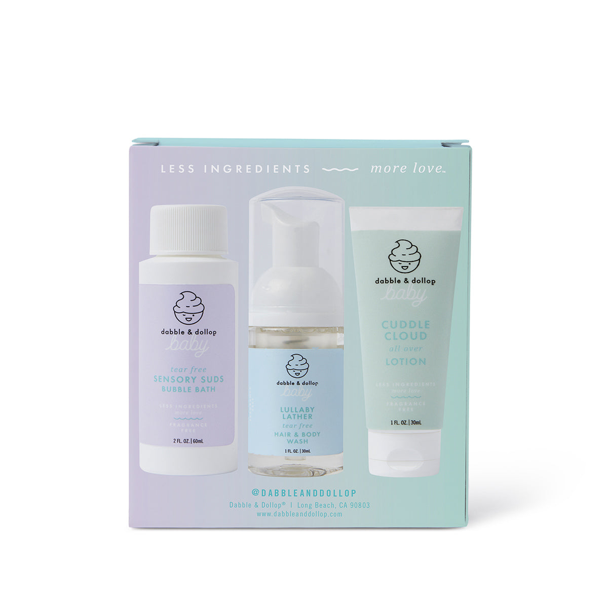 The Dabble & Dollop Bundle of Joy Minis Kit, featuring travel-size bubble bath, hair & body wash foam, and lotion, is displayed against a pale blue background with the product names and logo visible.