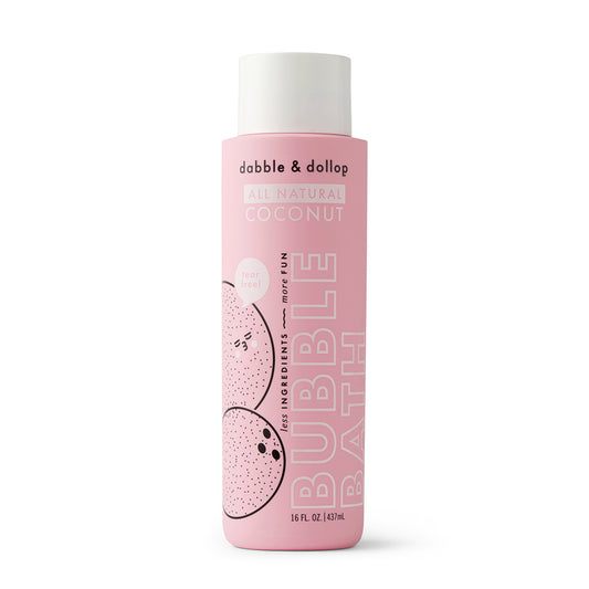 A 16 fl oz bottle of Dabble & Dollop Coconut Bubble Bath features playful coconut illustrations and white text on a pink label. This all-natural, hypoallergenic, and tear-free formula is perfect for gentle, bubbly fun at bath time.