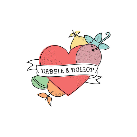 The I ❤️ Dabble & Dollop Temporary Tattoo features a red heart with a white Dabble & Dollop banner, surrounded by illustrated fruits and leaves on white. Kid safe and made in Southern California by Dabble & Dollop.