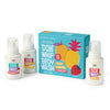 Three bottles of Dabble & Dollop Bath Gift Sets body wash—featuring strawberry, pineapple, and mango scents—are displayed with a vibrant gift box decorated with fruit illustrations and the product name, making them perfect for bath gift sets or for individuals with sensitive skin.
