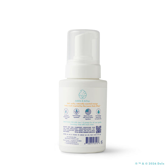 A white pump bottle labeled "Dabble & Dollop" features icons and text highlighting its natural, eco-friendly, vegan, and cruelty-free formula. It contains Dole Whip® Mango foaming body wash and is set against a plain white background.