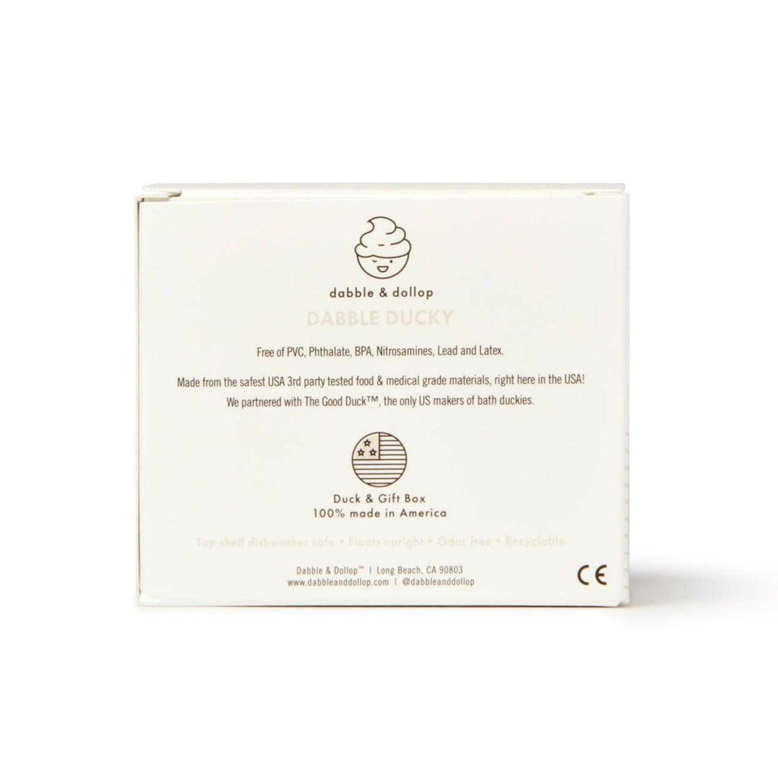 Back view of a Dabble & Dollop Ducky Bath Toy & Teether box. Text highlights the phthalate-free safety features of the duck toy, partnership with The Good Duck™, and its American manufacturing. Company details and social media handles are visible.