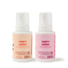 Discover the Dabble & Dollop Sugar, Spice & Suds Foaming Hand Wash Gift Set, featuring two bottles crafted with natural origin fragrances—one in a warm apple cinnamon scent and the other in a whimsical berry-jam scent. This charming seasonal set comes adorned with white pumps and pastel-colored labels, adding a festive touch to any space.