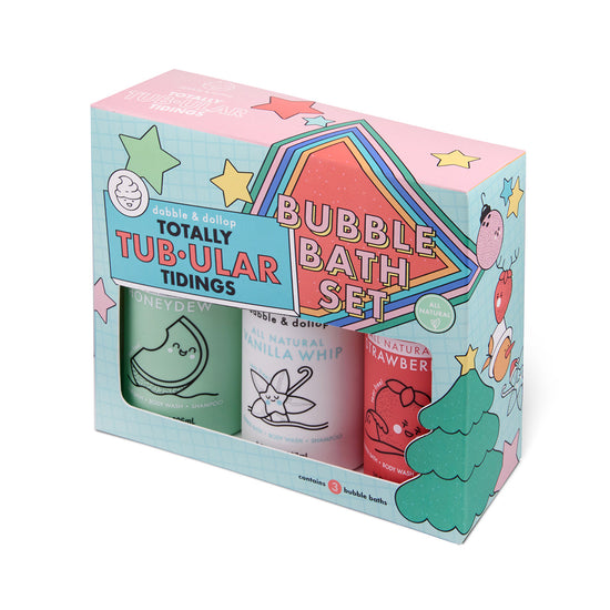 The Dabble & Dollop Totally Tub-ular Tidings Bubble Bath Set—Strawberry, Honeydew & Vanilla—features three festive bottles in a fun, fruit-and-star decorated box, making it a perfect gift for cheerful holiday bath times.