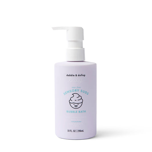 A light purple 10 fl oz (296 ml) bottle with a white pump features Dabble & Dollop Sensory Suds™ Bubble Bath and an illustrated swirl evoking a bubble bath.