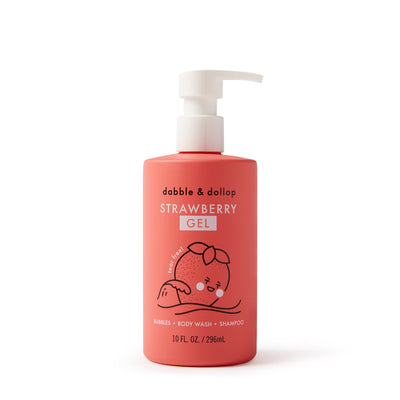 A pink 10 fl oz (296 ml) bottle of Dabble & Dollop Strawberry Bubble Bath, Body Wash & Shampoo with a white pump top and a cute cartoon strawberry on the label. All-natural, vegan 3-in-1 formula.