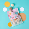 Opened pouch of sweet treat mini bath bombs