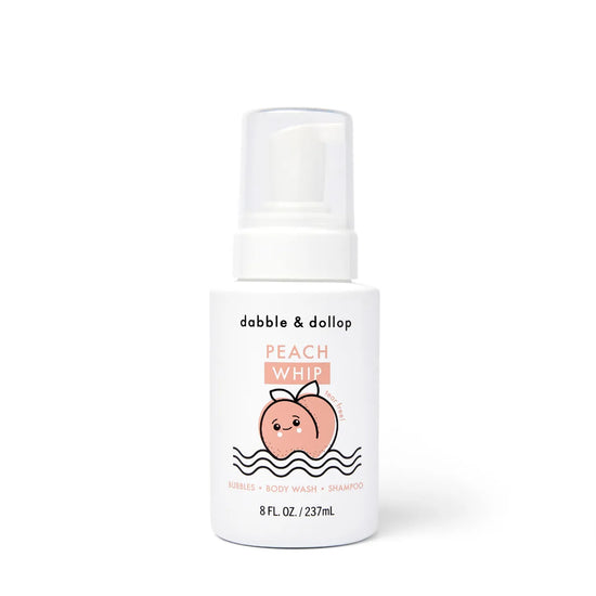 A white bottle of Dabble & Dollop Foaming Wash & Bubble Bath, 8 fl. oz., featuring a cute peach illustration with a smiling face and leaves on top.