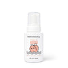 A white bottle of Dabble & Dollop Foaming Wash & Bubble Bath, 8 fl. oz., featuring a cute peach illustration with a smiling face and leaves on top.