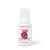 A white 8 fl oz (237 mL) bottle of Dabble & Dollop Foaming Wash & Bubble Bath with a pump top and a raspberry illustration on the label.