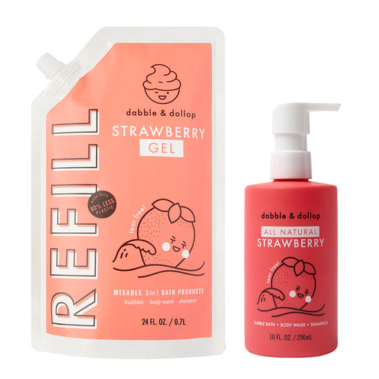 Dabble & Dollop's Strawberry Refill includes a large coral pink pouch with a spout, plus a smaller pump bottle. Both feature an illustrated strawberry character and playful white text—ideal for bubble bath or body wash.
