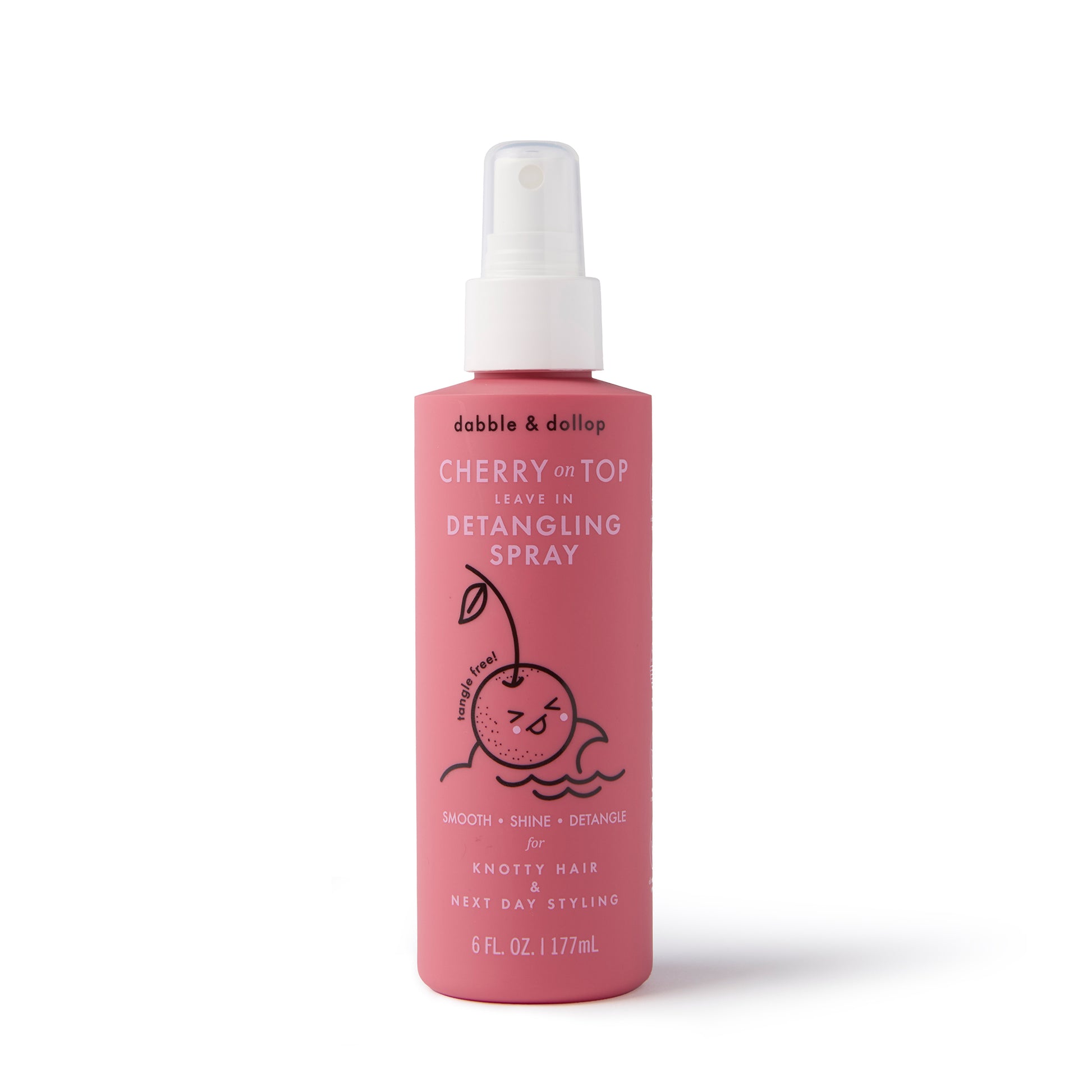 The Dabble & Dollop Cherry on Top Leave-In Spray Detangler is a kids' hair care essential in a pink bottle with a cartoon cherry and white spray nozzle, leaving hair smooth, shiny, and tangle-free.